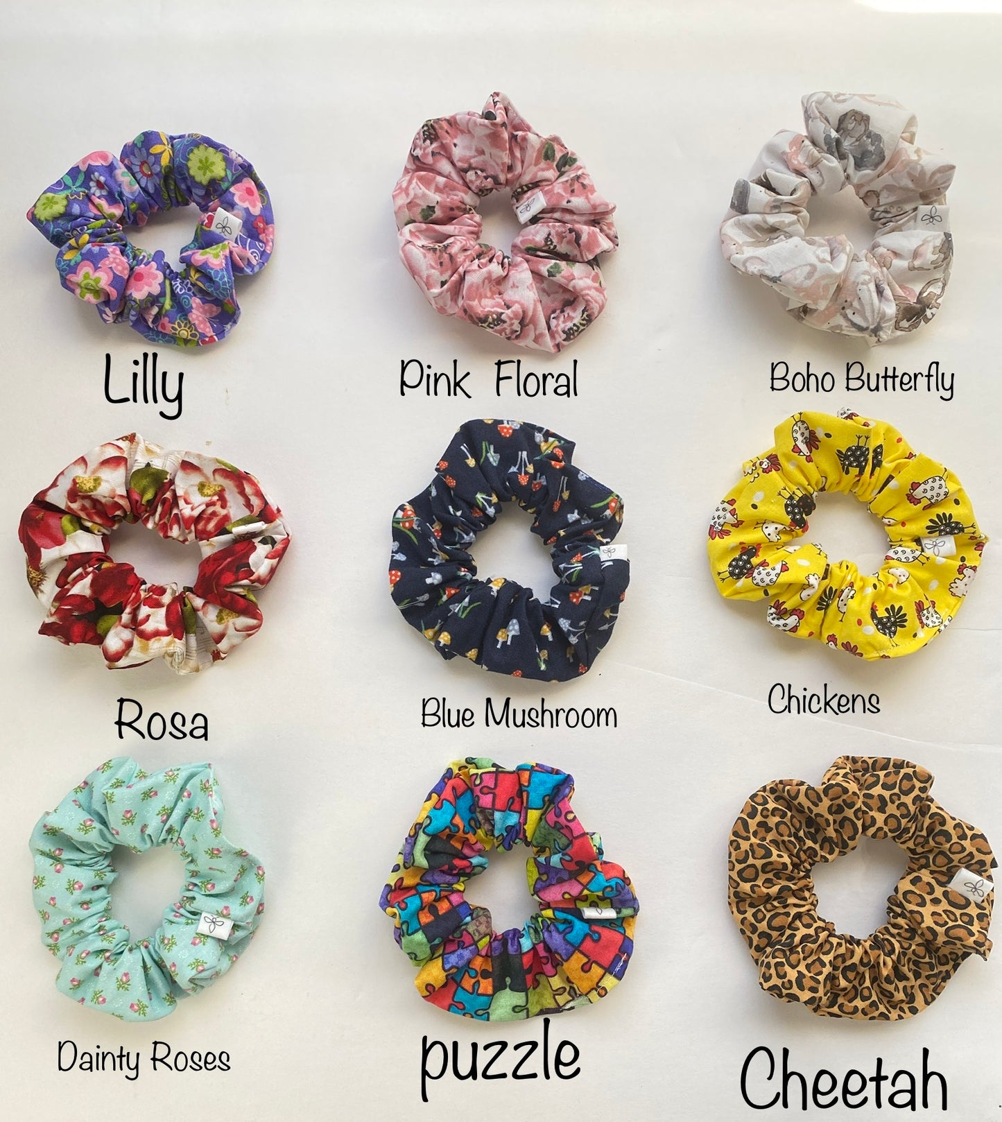 Colorful assortment of patterned scrunchies, vibrate collection of hair ties for a trendy look added to your ponytail or messy bun.